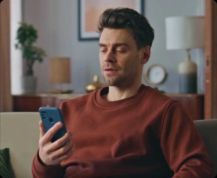 Man checking health insurance plans on his phone