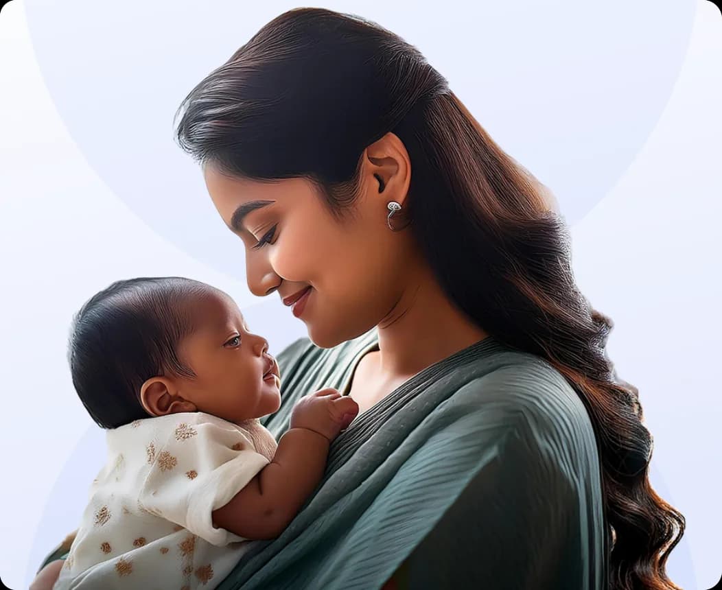 A mother smiling at her newborn
